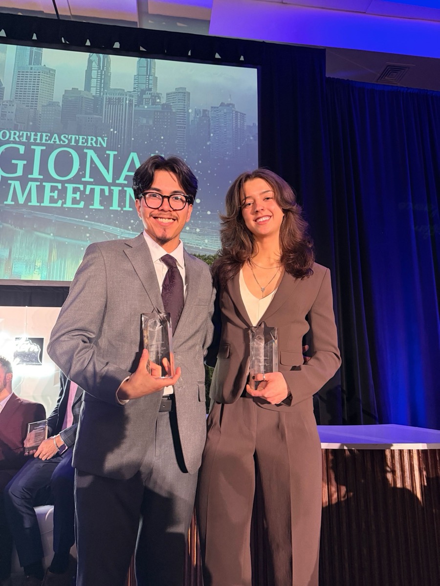 Greywolf Solutions team members receiving awards at the Northeastern Regional Meeting